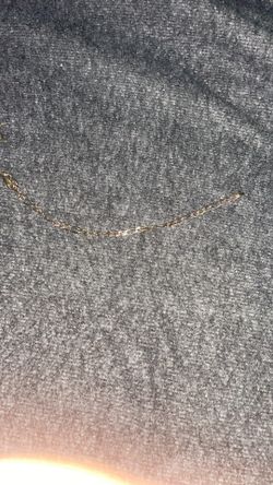 “Used gold bracelet, clasp with a unique detail—$250.” This is direct; it includes the price and highlights that it is an authentic gold bracelet.