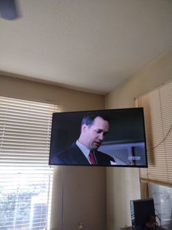 55 INCH TCL Flat Screen TV WITH Wall Mounted