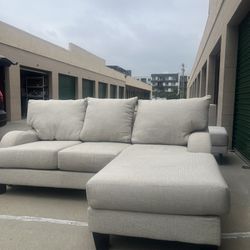Beige Sectional Couch With Reversible Chaise *Delivery available*