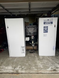 Two power vent gas water heaters