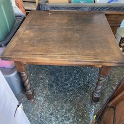Antique Dining Table With Built-In Leaves