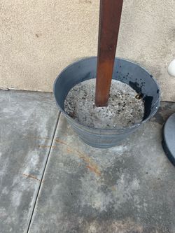 Gray Metal Planter Bucket with Concrete Base