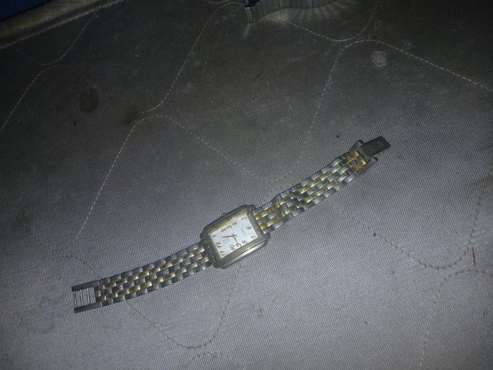 Goad and silver Coalex watch