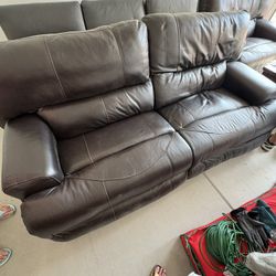 Electric Reclining Couch. Dark Brown
