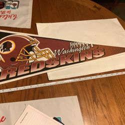 Washington Redskins brand new felt pennant. No pin holes or issues. Approximately 30” long