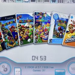 NINTENDO WII + 33 WII and GAMECUBE GAMES INSTALLED