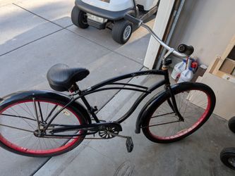 Black Beach Cruiser Bicycle with Red Rims