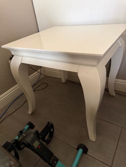 White corner table