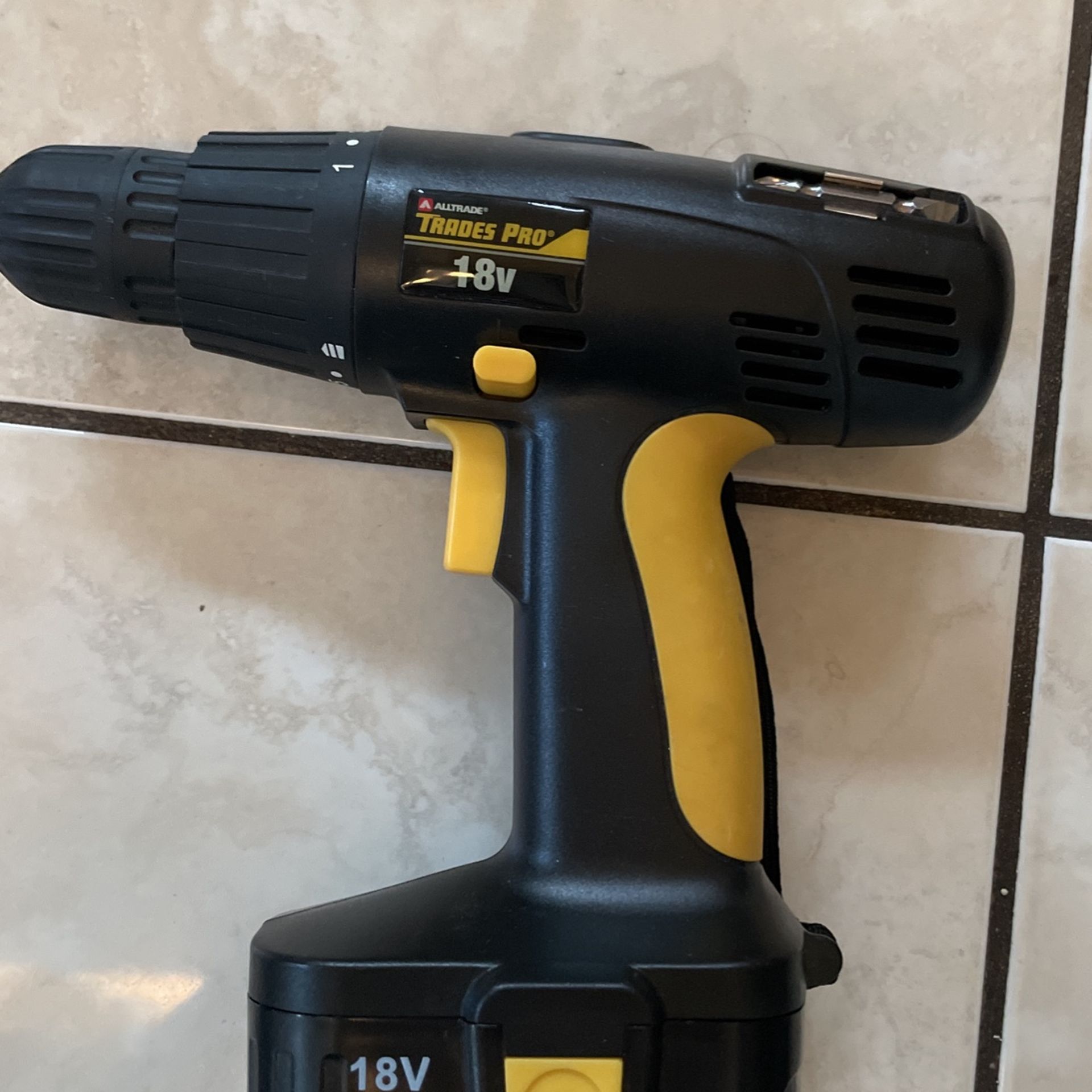 Tradespro 18-volt Cordless Drill with battery and charger open box.