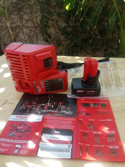 Milwaukee  12 v.   New Battery.   6.0 AH.   Charger
