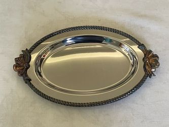 Vintage Oneida silver-plated oval serving tray with gilded bow handles. 6.75” X 11”