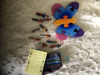 Wood puzzle and worry dolls