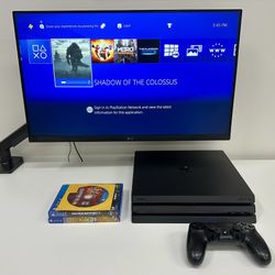 Sony PlayStation 4 Pro (1 Terabyte HardDrive) with games - CUH - 7215B