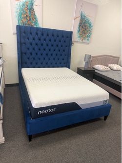Queen bed frame in blue velvet
