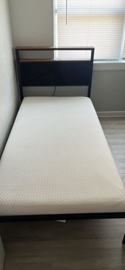 Twin mattress with outlet headboard