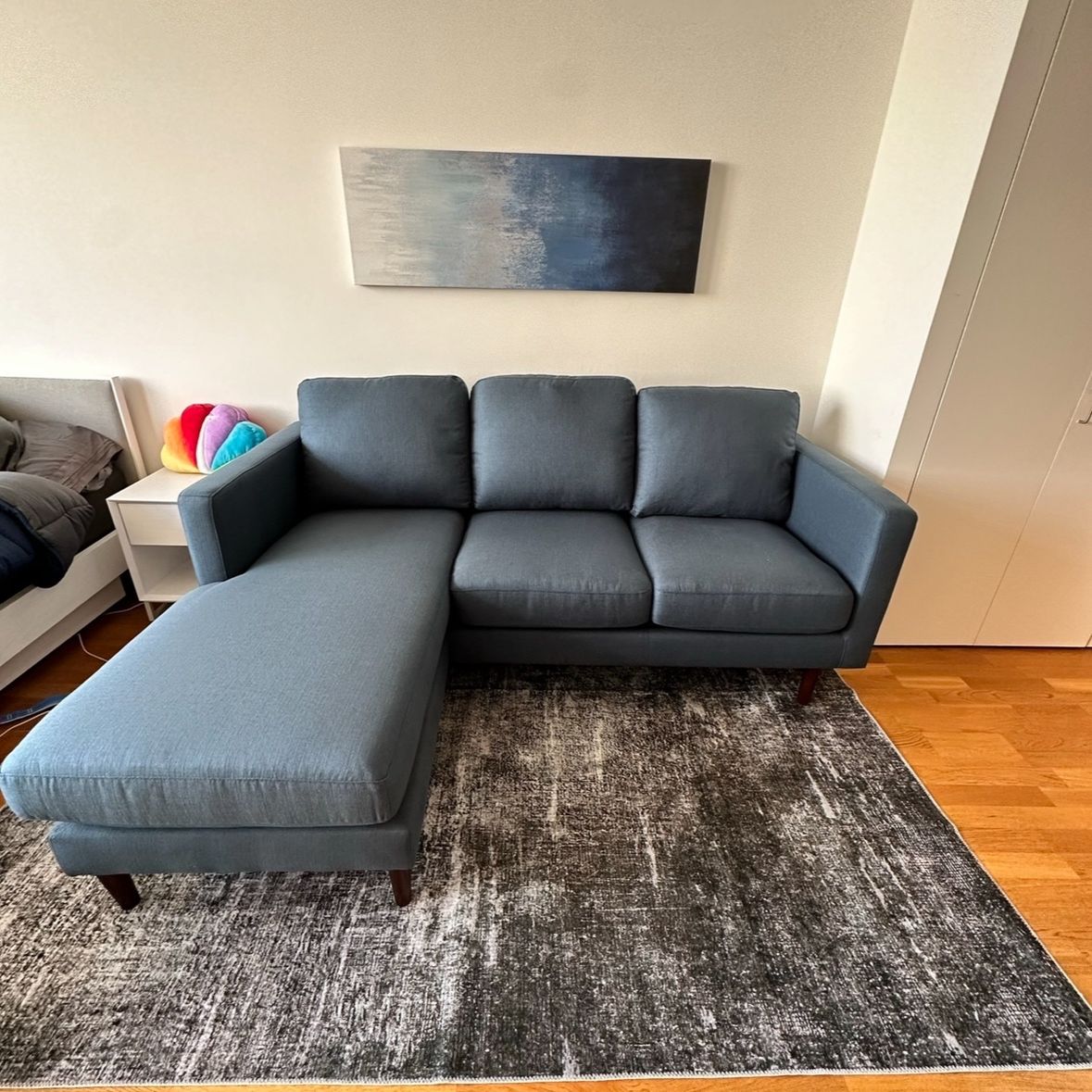 Rivet revolve deals modern sectional sofa