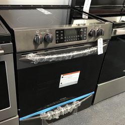 New Scratch And Dent Frigidaire Gallery 5 Burner Glass Top Black Stainless Steel Slide In Range. 1 year Warranty 