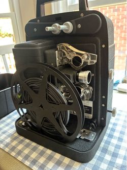 Bell&Howell vintage movie camera, projector, and screen