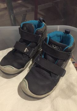 Pair of black basketball shoes