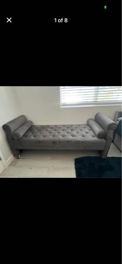 Grey tuffted lounge chair