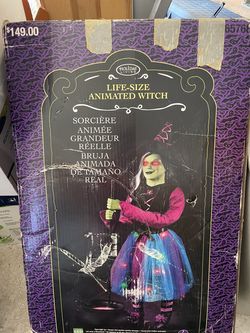 Life size animated witch Halloween decoration