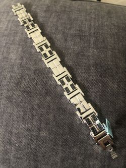 Mens stainless steel cz diamond and carbon fiber bracelet. 