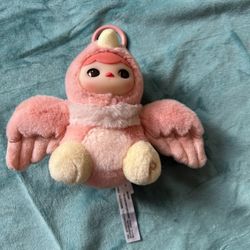 The POP MART PUCKY Forest Party Series plush pendant ("Birdie Baby" character)