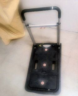 Dolly. Works Fine. Haven't Used It For A While. Maybe Some Lubrication Needed