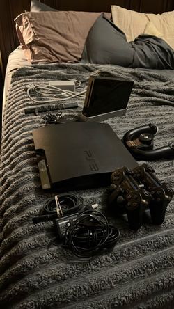 Sony PS3 with 2 controllers and Wii game console