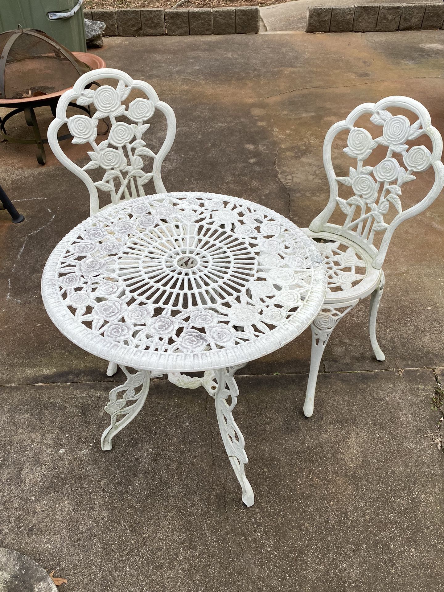 Cast Iron table and chairs 