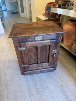 White clad antique end table
