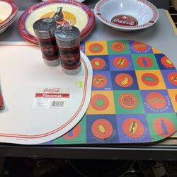 Free Shipping Coca Cola Lot of 4 plates. 4 bowls. 2 placemats. 1 cook book. Salt & pepper shakers. 