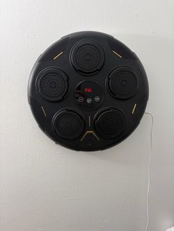 Electronic musical boxing with MMA gloves