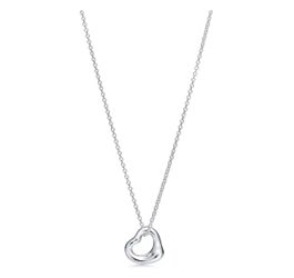 Authentic Tiffany & Co. Elsa Peretti Open Heart necklace in sterling silver (925).