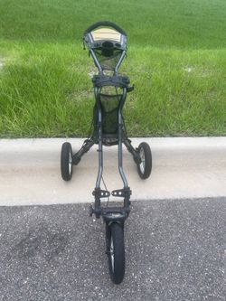 Sun Mountain Golf Speed Cart V2 Push Pull Collapsible Foldable Holder Black. Location below . Used in good condition with some cosmetic blemishes. The
