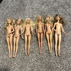 6 Barbie Dolls 