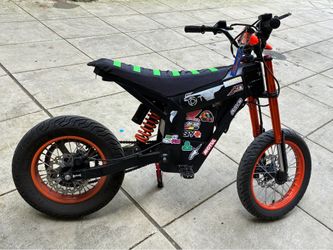 Tuttio Soliel 01 with Supermoto tires and seat cover