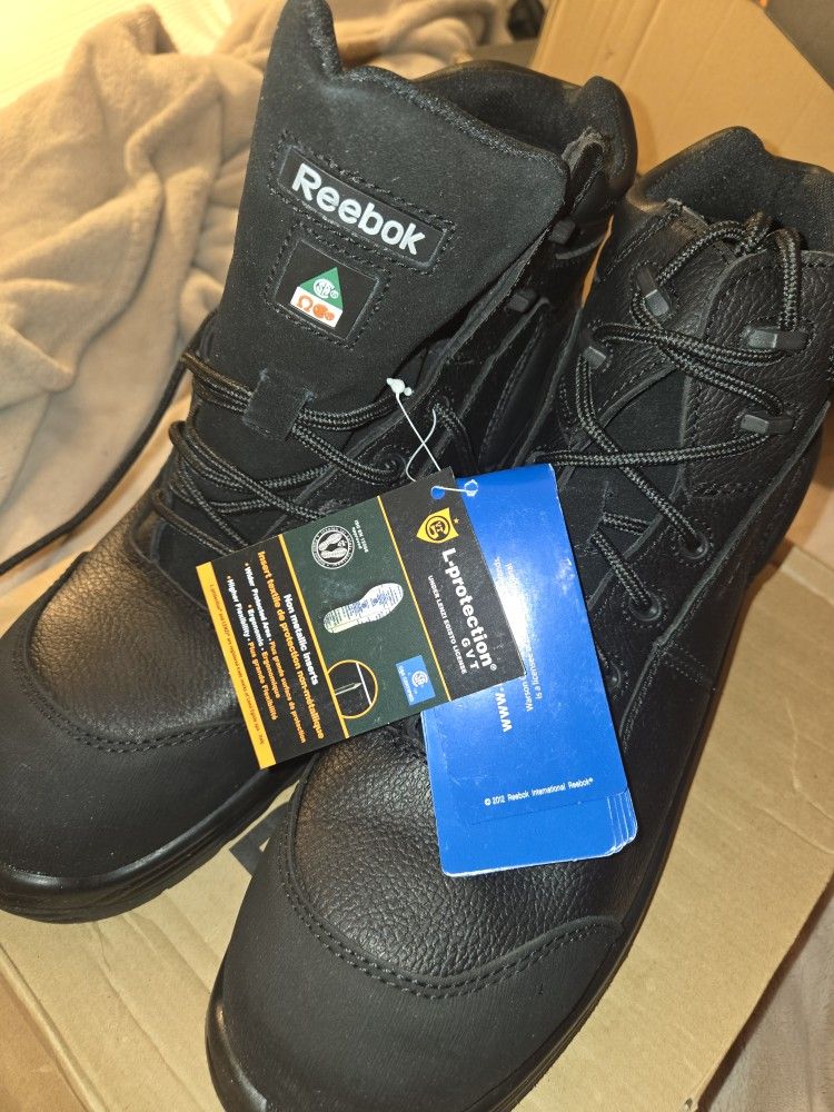 New In Box Reebok steel toe waterproof work boots.