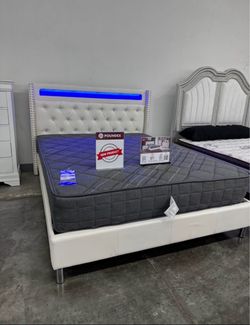 New Queen bed with mattress