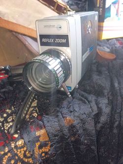 Lot of antique cameras and some older security cams .
