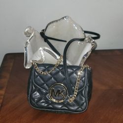 Black Quilted Leather Crossbody Bag with Gold Logo.