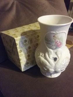 Precious moments girl with swan vase