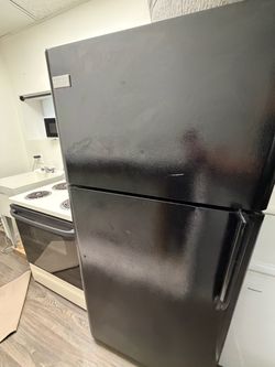 Frigidaire Black Refrigerator with Top Freezer – Full Size