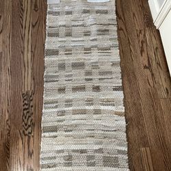 Beige Rug.  Brand New.  1.8 X5.