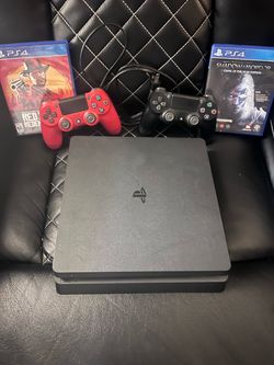 PS4 Slim CUH‑2215B Bundle – 2 Controllers + Red Dead Redemption 2 & Shadow of Mordor
