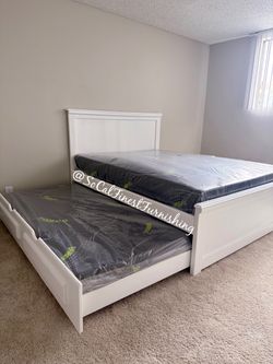 Queen bed with trundle and mattresses