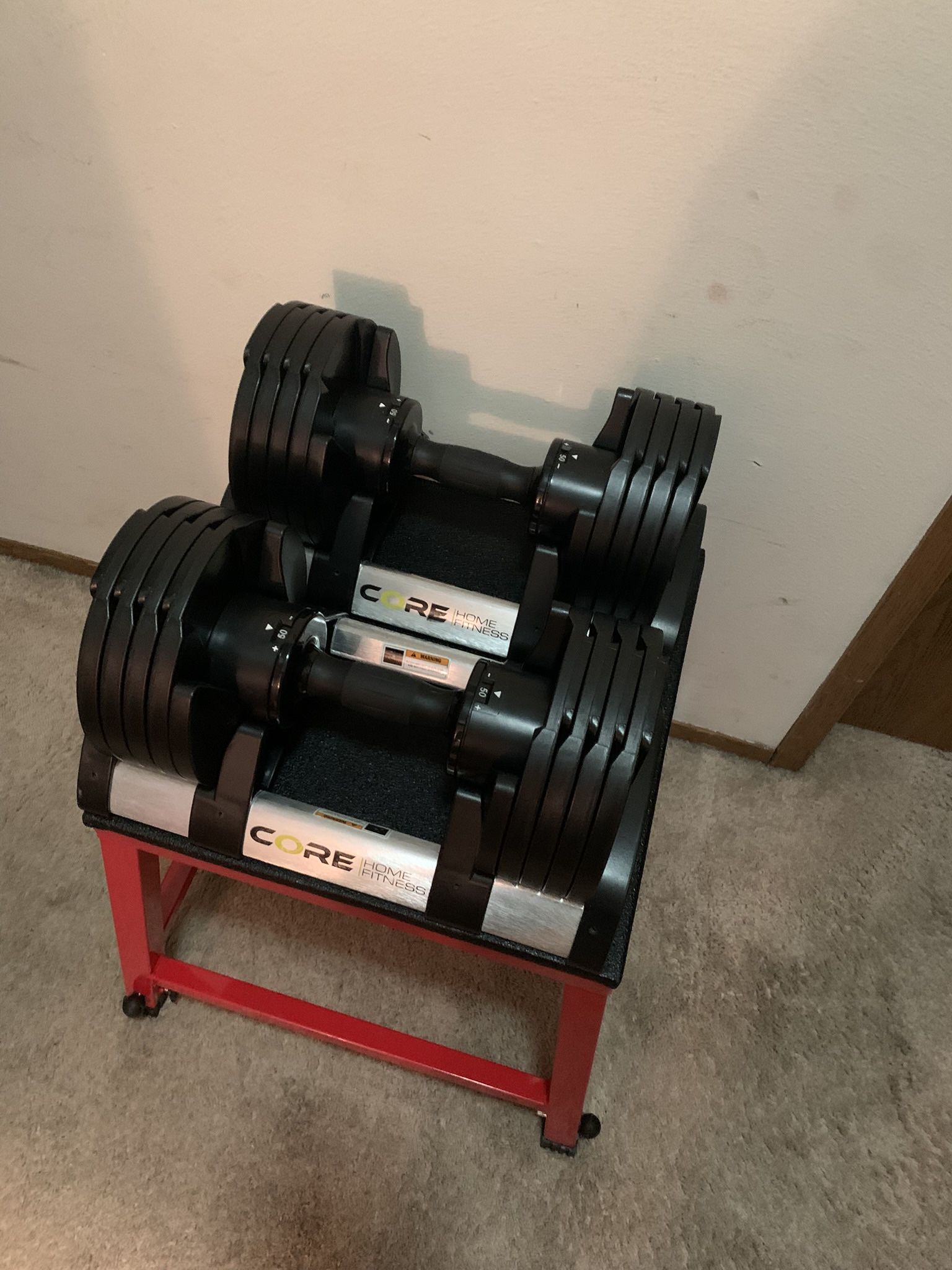 Core Fitness Adjustable Dumbbells: 5 - 50 Pounds each dumbbell
