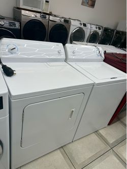 Kenmore top load washer and electric dryer set