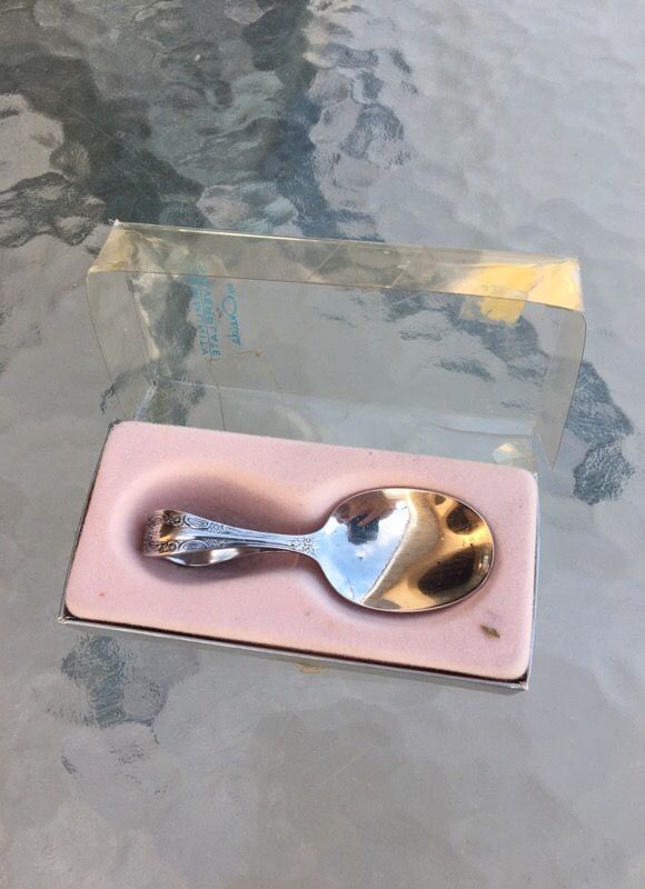 Community Silverplate by Oneida bent spoon