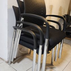 Set of 3 Heavy Duty Stacking Chair, 550 lb. weight capacity, black capped arms.